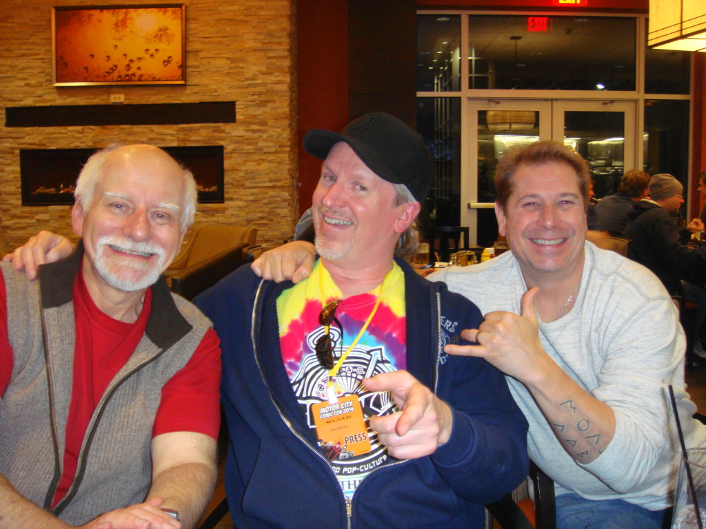 Chris Claremont, JJ, and Billy Tucci hang out at dinner.